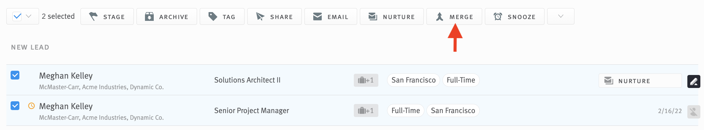 Two opportunities selected in the opportunity list with arrow pointing to Merge button in bulk action toolbar.