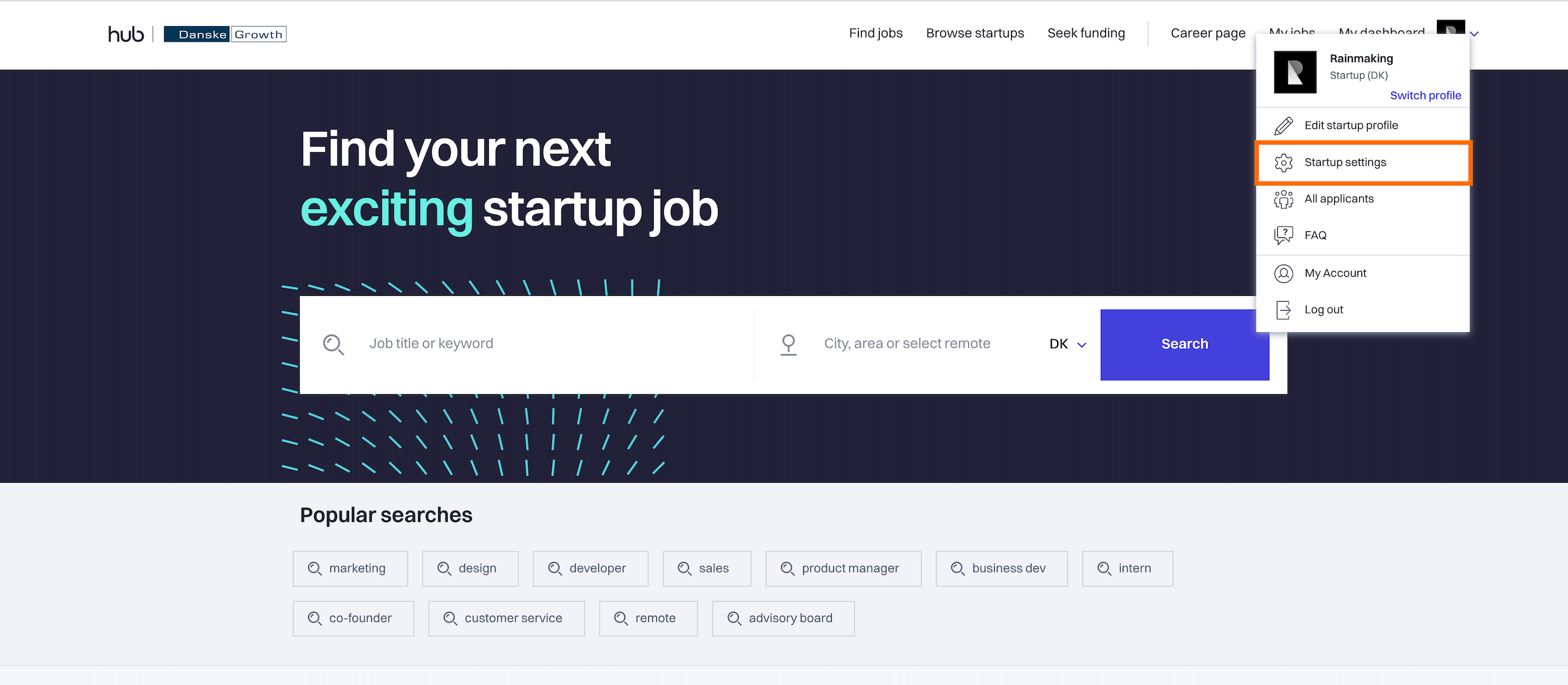 The Hub homepage with setting menu expanded and Startup settings option outlined.