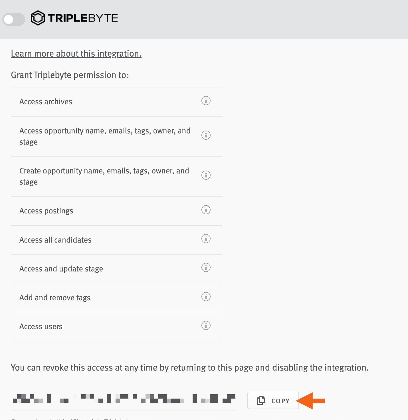 Arrow pointing to copy button next to generated API key on Triplebyte integration tile