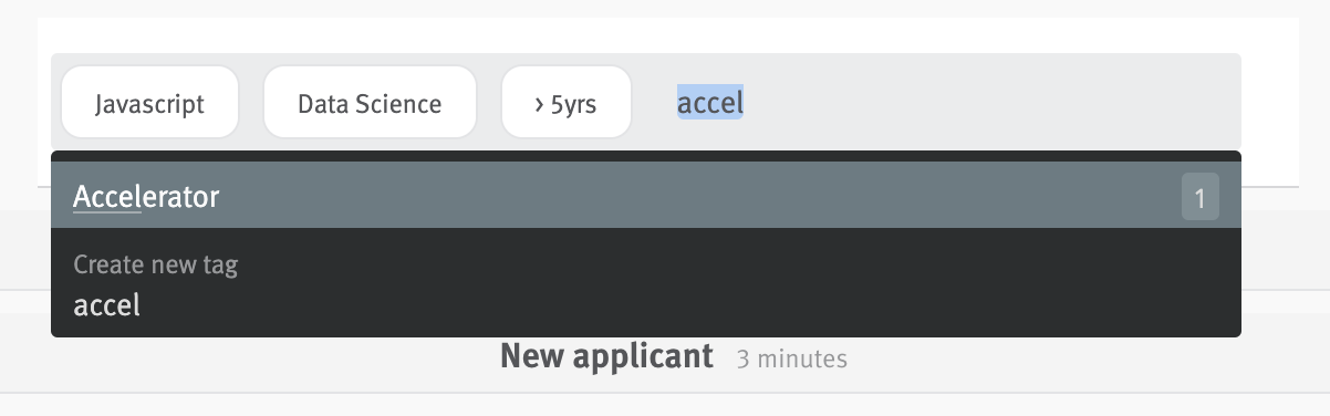 Close-up of tags field on opportunity profile with text typed into field and menu extending with options for existing tags matching that text.
