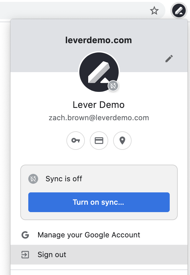 Chrome profile menu extending from avatar with sign out option highlighted.