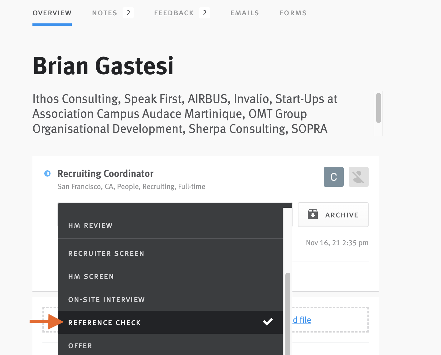 Arrow pointing to reference check stage in stage menu expanded on candidate profile.